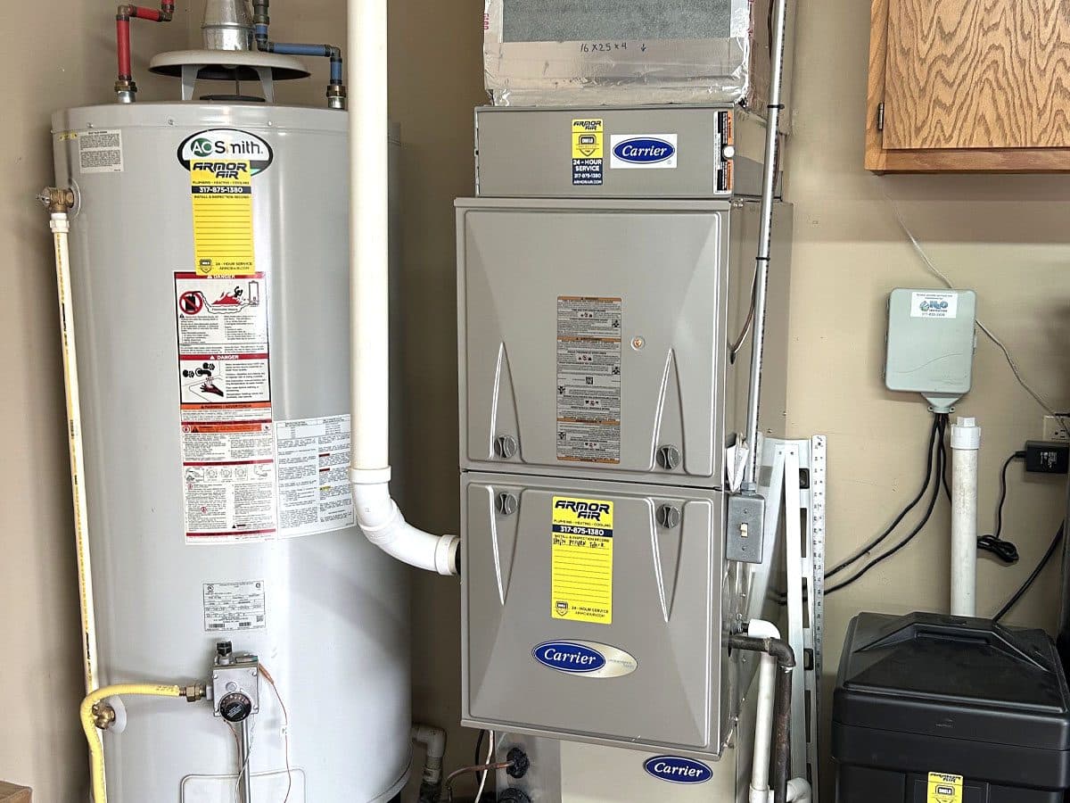 Armor Air plumber installing a residential water heater